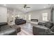 Bright living area featuring an electric fireplace and seamless flow into other spaces at 209 Sheffield Dr, York, SC 29745