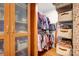 Walk-in closet with storage bins, shelves and clothing rack at 218 N Bost St, Statesville, NC 28677
