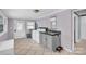 Large laundry room with plenty of storage and sink at 218 N Bost St, Statesville, NC 28677