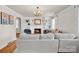 Comfortable living room with a cozy fireplace, custom built-ins and natural light for a relaxing atmosphere at 218 N Bost St, Statesville, NC 28677