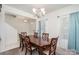 Bright dining room featuring a wooden table, six chairs, and natural light at 4406 Huntley Glen Dr, Pineville, NC 28134
