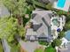 Aerial view of luxury property with a stunning pool, patio, and manicured garden at 4465 3Rd Nw St, Hickory, NC 28601