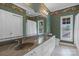 Bathroom with a large mirror, double sink vanity, and floral wallpaper at 4465 3Rd Nw St, Hickory, NC 28601