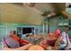 Finished bonus room with unique ceiling fan, media center, and comfortable seating area at 4465 3Rd Nw St, Hickory, NC 28601