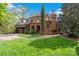 Beautiful two-story brick house with a three-car garage, dormer windows, and mature landscaping at 4465 3Rd Nw St, Hickory, NC 28601