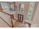 Grand foyer with hardwood floors, a chandelier, and large windows providing natural light at 4465 3Rd Nw St, Hickory, NC 28601