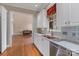 Bright, white kitchen featuring stainless steel appliances and a seamless transition to living spaces at 4465 3Rd Nw St, Hickory, NC 28601