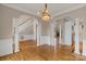 Spacious living room with hardwood floors and columns to other rooms at 4465 3Rd Nw St, Hickory, NC 28601