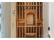 Custom wood wine rack with storage for a vast collection in a climate controlled room at 4465 3Rd Nw St, Hickory, NC 28601
