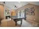 Game room with ping pong table and lots of artwork at 4561 Walden Pond Trwy, Concord, NC 28025