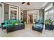 Sunroom with natural light and a view into the dining room at 4561 Walden Pond Trwy, Concord, NC 28025