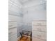 Organized walk-in closet with wire shelving and convenient storage options at 4561 Walden Pond Trwy, Concord, NC 28025
