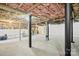 Spacious unfinished basement with exposed beams and utilities at 600 3Rd St, Spencer, NC 28159