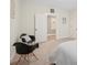 Bright bedroom featuring carpet, minimalist decor, and good lighting at 600 3Rd St, Spencer, NC 28159