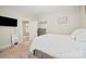Cozy bedroom featuring neutral tones, carpet, and stylish wall decor at 600 3Rd St, Spencer, NC 28159