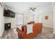 Inviting living room offers hardwood floors, comfortable leather seating, and a cozy atmosphere at 600 3Rd St, Spencer, NC 28159