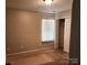 Bedroom with neutral walls, carpet, a closet and window at 616 Mountain Quail Dr, Charlotte, NC 28216