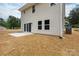 Exterior of home with sliding glass doors and new landscaping provides an inviting outdoor space at 6223 Rockwell W Blvd, Charlotte, NC 28269