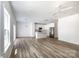 Bright and airy living room with luxury vinyl plank flooring and recessed lighting at 6223 Rockwell W Blvd, Charlotte, NC 28269
