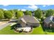 Beautifully landscaped home with spacious backyard and patio area, perfect for outdoor entertaining at 630 Deberry Holw, Rock Hill, SC 29732