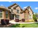Elegant brick and stone home featuring a beautifully landscaped front yard and garden at 630 Deberry Holw, Rock Hill, SC 29732