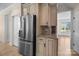 Open kitchen features granite counters, tile flooring, and stainless appliances at 630 Deberry Holw, Rock Hill, SC 29732