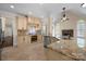Gourmet kitchen boasts granite countertops, stainless steel appliances, and a seamless connection to the living area at 630 Deberry Holw, Rock Hill, SC 29732