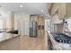 Bright kitchen with stainless steel appliances, granite countertops, and tile flooring at 630 Deberry Holw, Rock Hill, SC 29732