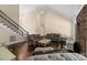 Spacious living room with hardwood floors, stone fireplace, and a cozy seating area at 630 Deberry Holw, Rock Hill, SC 29732