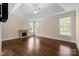Spacious primary bedroom boasts a trey ceiling, fireplace, and ample natural light from large windows at 630 Deberry Holw, Rock Hill, SC 29732