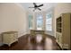 Bright office space with hardwood floors, three windows for natural light, and built-in cabinets for storage at 630 Deberry Holw, Rock Hill, SC 29732