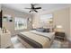 Bedroom with neutral tones, a ceiling fan, and a large window at 630 Deberry Holw, Rock Hill, SC 29732
