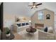 Bright bonus room with a ceiling fan, window, sofa, armchair, and a foosball table at 630 Deberry Holw, Rock Hill, SC 29732