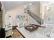 Cozy living room with fireplace, stairs, and stylish furniture at 630 Deberry Holw, Rock Hill, SC 29732