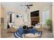 Cozy living room featuring a stone fireplace, recessed lighting, and ample seating with natural light at 630 Deberry Holw, Rock Hill, SC 29732