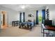 Bedroom with a bed, desk, and large windows offering natural light at 648 Revival Row, Fort Mill, SC 29708