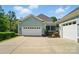 Attached two car garage with extra storage at 648 Revival Row, Fort Mill, SC 29708