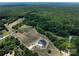 Scenic aerial view of the property showcasing its location amongst lush trees and greenery at 6511 Rehobeth Rd, Waxhaw, NC 28173