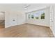 Bedroom with hardwood floors, ceiling fan and natural light at 6511 Rehobeth Rd, Waxhaw, NC 28173