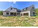 Under construction, this home features a three-car garage and a covered porch at 6511 Rehobeth Rd, Waxhaw, NC 28173