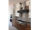 Modern kitchen with stainless steel appliances, white cabinets, and subway tile backsplash at 6511 Rehobeth Rd, Waxhaw, NC 28173