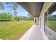 View of large grassy backyard from the back patio at 6907 Lancaster Hwy, Waxhaw, NC 28173