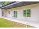 Back patio with sliding glass doors and outdoor access at 6907 Lancaster Hwy, Waxhaw, NC 28173