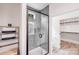 Contemporary bathroom featuring a glass-enclosed shower, a towel rack with plush towels, and an adjacent water closet at 6907 Lancaster Hwy, Waxhaw, NC 28173