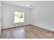 Bright bedroom boasts natural light, neutral walls, and modern flooring at 6907 Lancaster Hwy, Waxhaw, NC 28173