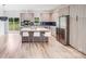 Modern kitchen featuring an island with seating and stainless steel appliances at 6907 Lancaster Hwy, Waxhaw, NC 28173