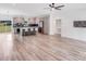 Spacious open floor plan with modern kitchen island and stainless appliances, perfect for entertaining guests at 6907 Lancaster Hwy, Waxhaw, NC 28173
