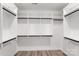 Spacious walk-in closet with custom shelving and ample storage space, providing organization and convenience at 6907 Lancaster Hwy, Waxhaw, NC 28173