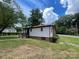 Cozy single-story home features fresh paint, trimmed hedges, and a lush lawn at 717 Wilshire Sw Ave, Concord, NC 28025