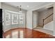 Cozy breakfast nook features a charming bay window with natural light and hardwood flooring at 7753 Jackson Pond Dr, Charlotte, NC 28273